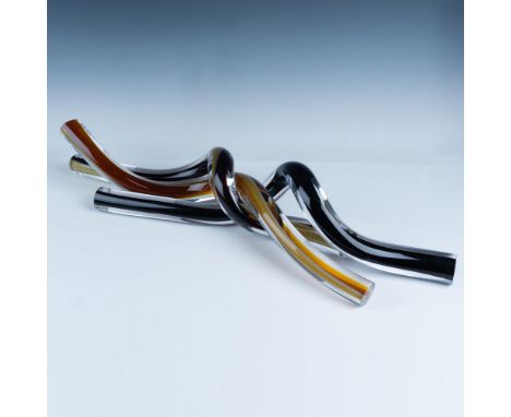 A captivating set of three spiral glass pieces, each with a clear exterior showcasing vibrant interiors one in deep black, an