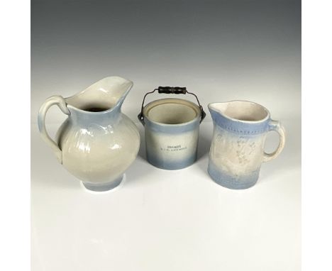 Lovely trio of blue-tinted stoneware with a salt glaze finish. The larger pitcher measures 8.5"L x 7"W x 9.5"H. The smaller p