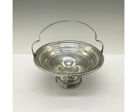 This is a beautifully crafted, intricately reticulated sterling silver basket. It is marked cemented reinforced and has a tot