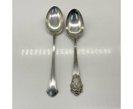 This pair of gorgeous sterling silver spoons features a Chippendale sterling silver spoon and a Georgian spoon by Towle Silve