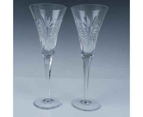 This pair of Waterford crystal Health flutes is from the Millennium Collection, A Toast to the Year 2000. Part of a special e
