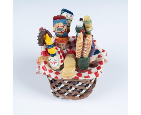 Adorable picnic basket that holds 4 stainless steel spreader knives. Each knife is decorated with picnic items and measures 5
