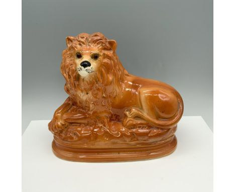 Regal figure of a lion perched on a platform that was once used paired with a desk lamp. Issued: 20th centuryDimensions: 11.2