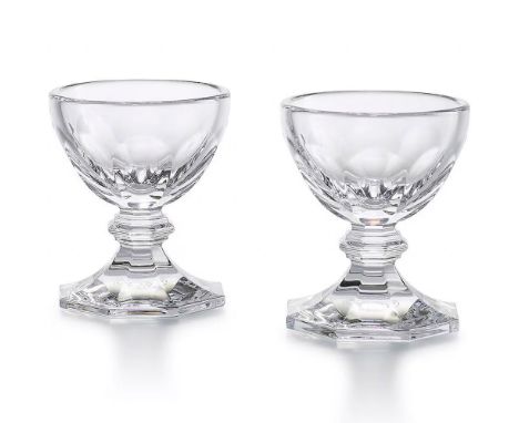 Includes 2 crystal glasses with the iconic hexagonal base and flat cuts, embodying timeless elegance. 2814005. This item has 