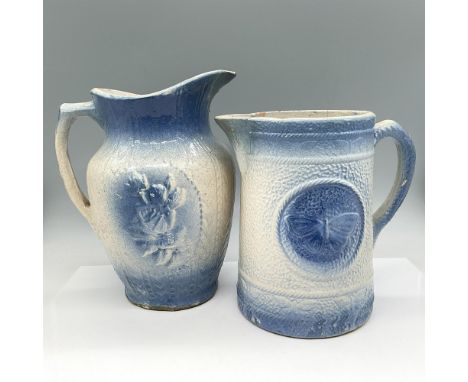 Early 20th century pieces colored in pale blue and gray with distinct designs. Large pitcher (10"H) has raised floral bouquet