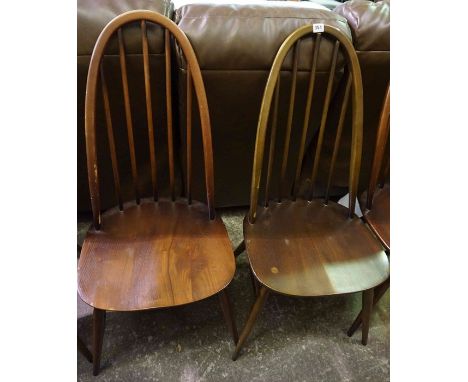 Set of Eight Ercol Comb Back Chairs, Including two Armchairs, 97cm high, (8)