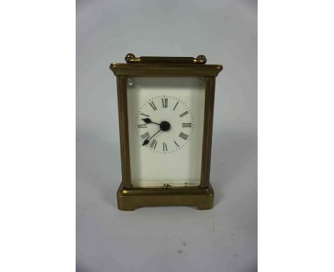 Brass Carriage Clock, Having a white enamel dial, 11cm high, Engraved to top of Clock, No key 