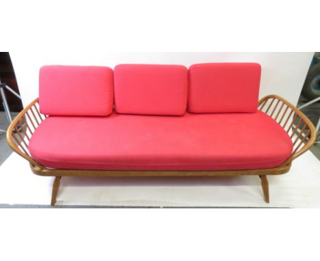 A modern Ercol day bed sofa, upholstered in a red fabric, 58cm high, 203cm long, 75cm deep