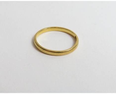 A plain 22 carat gold wedding ring, 1.7g gross