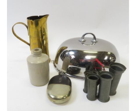 A stainless steel meat cover; a leather covered glass flask with silver plated cup base; a stoneware ink bottle; some metal m