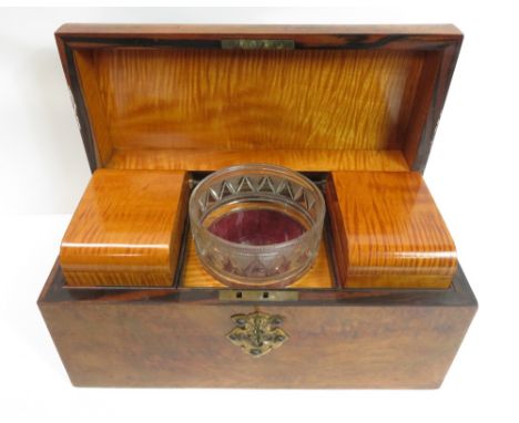 A 19th century walnut tea caddy, with a satinwood interior and glass mixing bowl