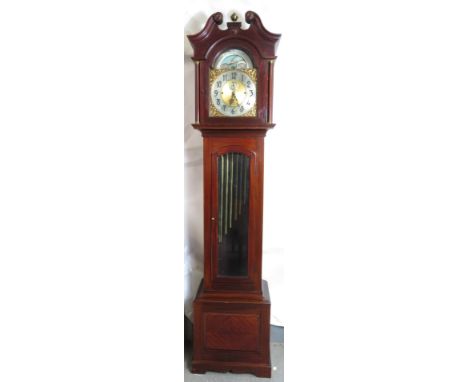 Large 20th three train musical longcase clock striking on nine brass tubes, silver dial with rolling moon in arch and centre 