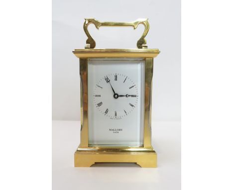 A modern brass cased carriage clock, retailed by Mallory, Bath