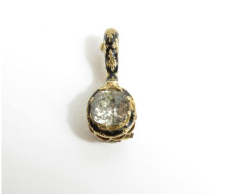 A 19th century paste set comet brooch, unmarked, with black enamel decoration, 2.6cm long
