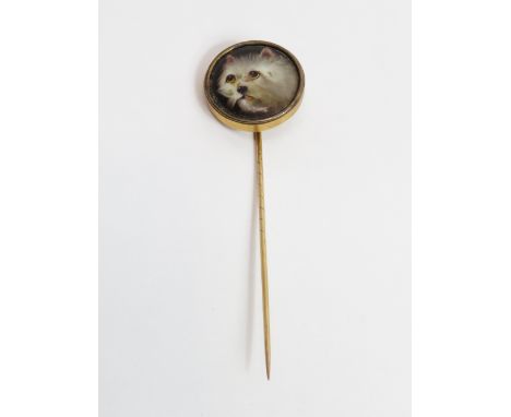 A W. Essex ceramic stick pin of a terrier, signed and dated 1858 to the reverse, 2.4 cm diameter