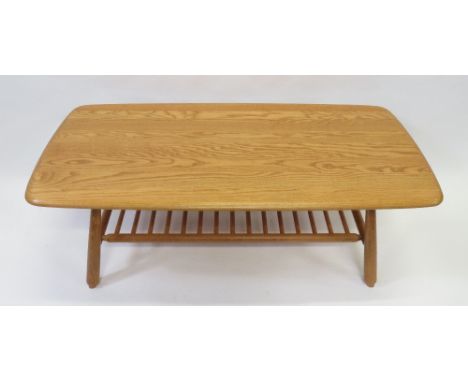 An Ercol elm and beech coffee table, 35cm high, 103cm long, 47cm deep