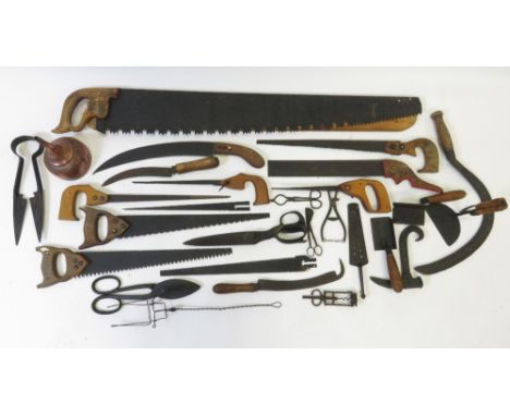 A collection of farming/agricultural tools