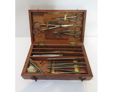 A collection of 20th century Dental tools in a fitted mahogany case by Flatters &amp; Garnett, Manchester
