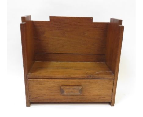 An oak Art Deco table top book shelf, with a single short drawer, 38cm high, 38cm long, 18.5cm