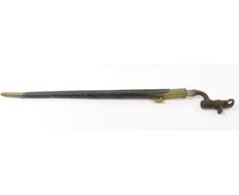 A 19th century socket bayonet, in a leather and brass scabbard 67.5cm long