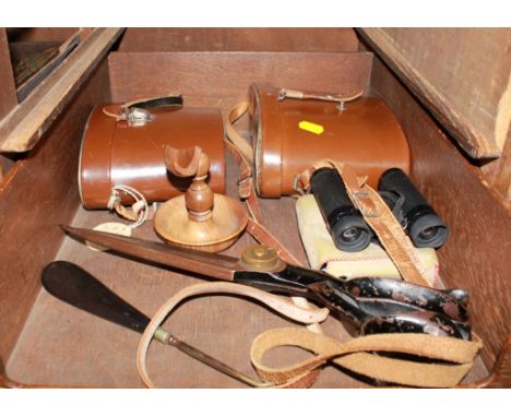 An eclectic lot to include a collection of mid 20th century binoculars, a wooden pipe holder, shoe horn, etc