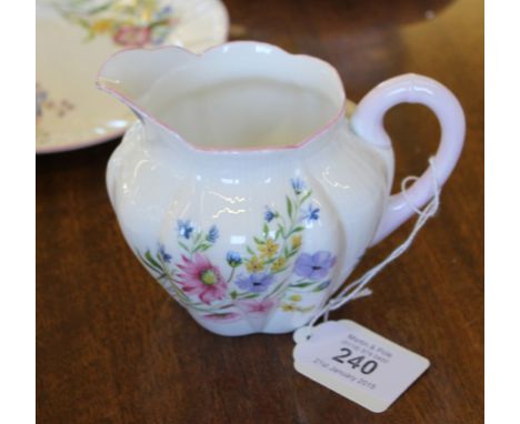 A Shelley 'Wild Flowers' twenty-one piece tea service to include cups, saucers, plates, sugar bowl, jug and serving plate