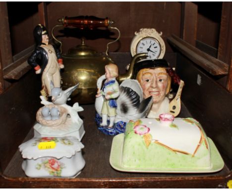 A selection of household ceramics to include one Toby jug, mantle clock and brass teapot, etc