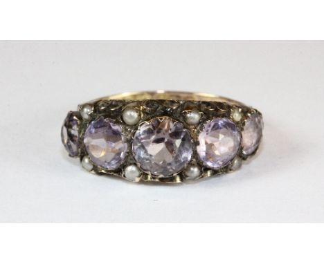 An antique 9ct gold pale amethyst and seed pearl ring (O)