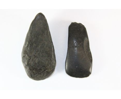 A Neolithic polished Celt axe head excavated Toome, County Antrim together with a similar axe head