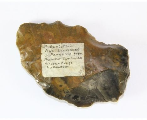 A Palaeolithic stone axe head excavated at Farnham from Prof Sir Lucas White-King (1856 - 1925) collection Prov. Richardson c