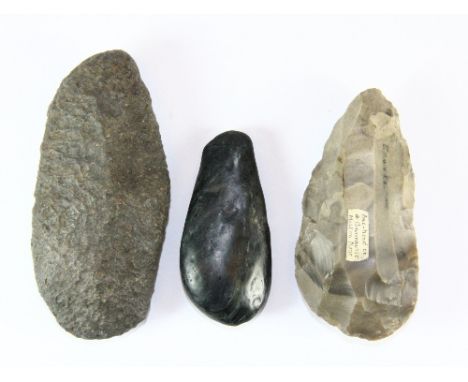 A Neolithic axe head excavated at Grovenhurst, Milton Kent, L 9cm, together with 2 further axe heads