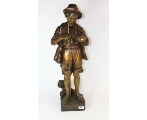 A large Goldscheider pottery figure of a boy with a fish, H 74cm (A/F)