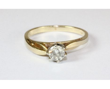 A 14ct gold diamond solitaire ring (L)