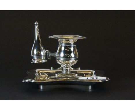 A hallmarked silver chamber stick and snuffer