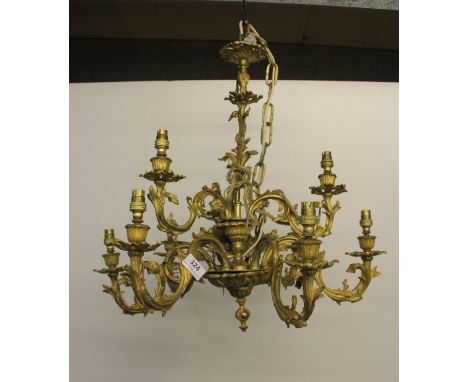 A gilt brass chandelier light fitting with a matching 2 branch wall light, Dia 54cm