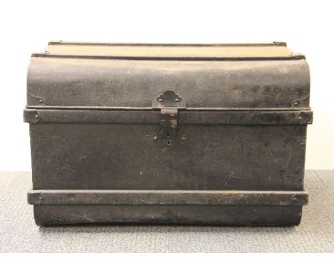A vintage tin cabin trunk