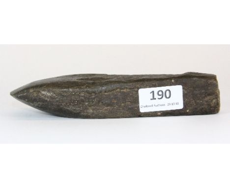 A Neolithic stone axe head excavated in Caithness Prov. Richardson collection/originally Prof Sir Lucas White-King (1856 - 19