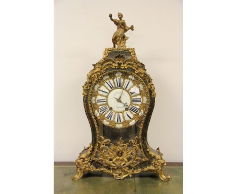 A large 18th century French ormolu mounted clock with gilt and porcelain dial by Etienne Levasseur of Paris, H 80cm. Original