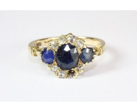 An 18ct yellow gold sapphire and diamond ring (1 diamond missing) (O.5)