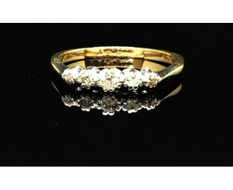 An 18ct platinum five stone diamond ring, size M.