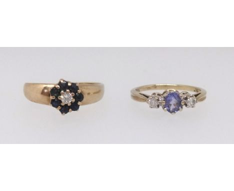 A 9ct tanzanite and diamond three stone ring together with a sapphire and diamond small cluster ring (2).