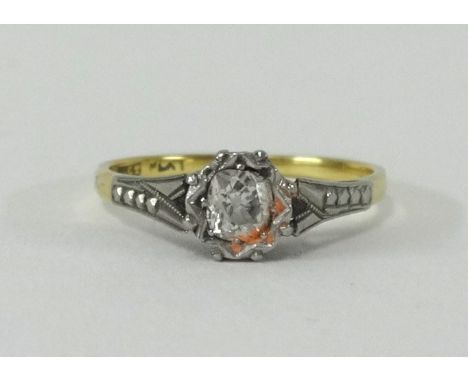 An 18ct single stone diamond ring, size N.
