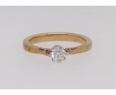 An 18ct single stone diamond ring, size N.