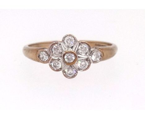 A 9ct modern diamond set cluster ring, size P.