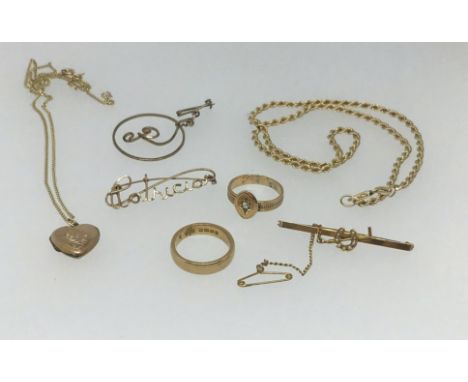 An 18ct wedding band (approx 6.8gms), two 9ct necklaces and a brooch (approx 17gms) and a unmarked ring (approx 3gms).