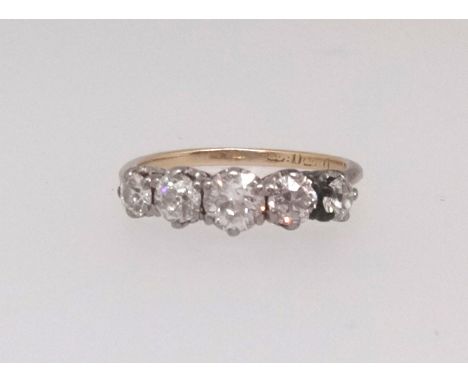 An 18ct five stone ring set with old cut diamonds, size K.