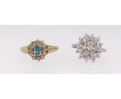 A 9ct cubic zirconia cluster ring together with a 9ct topaz small cluster ring (2).