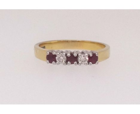 A 18ct ruby and diamond five stone ring, size P.