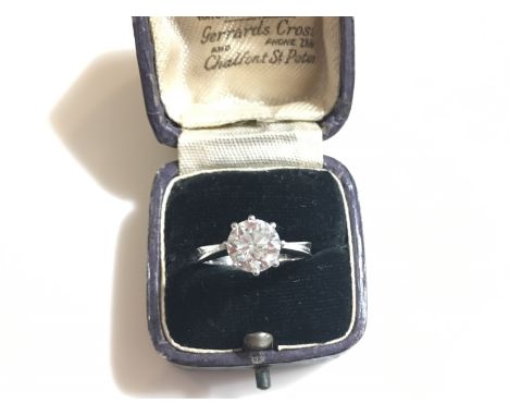 A good diamond solitaire ring set, approx 2 carats, set in unmarked white gold possibly platinum, size N.