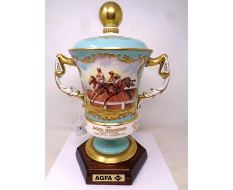 An impressive twin handled trophy cup commissioned by Aynsley, hand painted, awarded for the Agfa Diamond Steeplechase, Febru